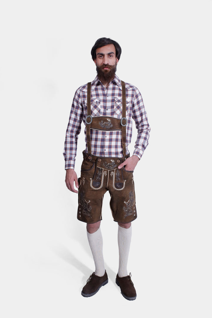 complete view of a man wearing traditional lederhosen suspenders