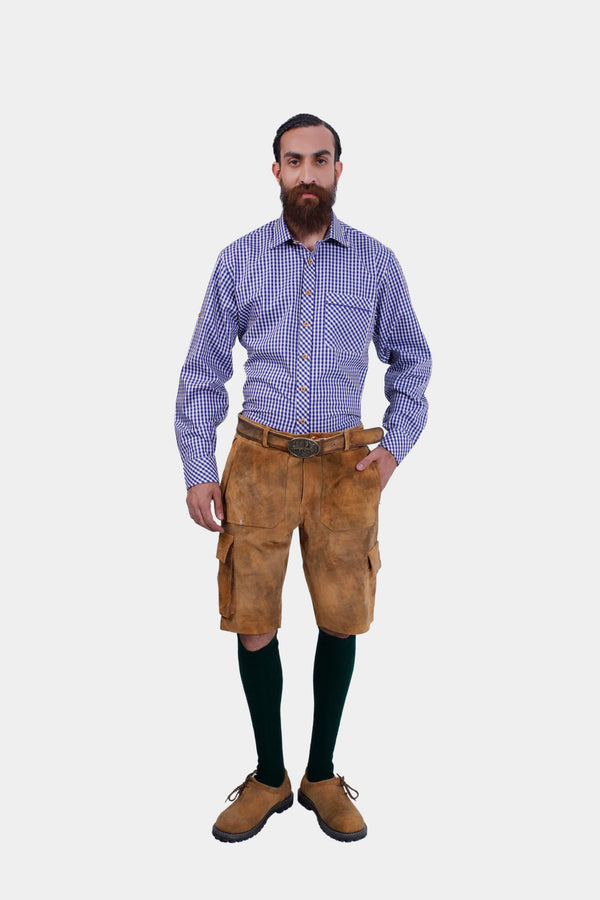 Full-body front view of a model in the Franzl Lang Cargo Lederhosen in Tuscan Sunburst, showing the complete outfit with traditional accessories.