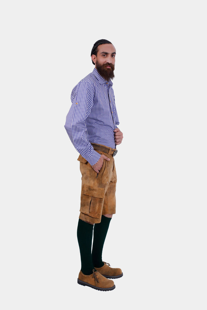 A side angle view of the Franzl Lang Cargo Lederhosen in Tuscan Sunburst, demonstrating the fit and functional pockets, with a blue and white checkered shirt.