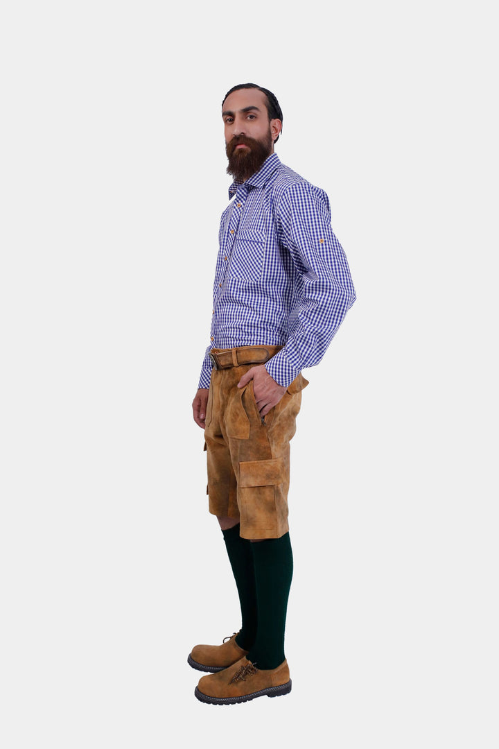 A dynamic side pose of a model in the Franzl Lang Cargo Lederhosen in Tuscan Sunburst, emphasizing the rich color and traditional attire.