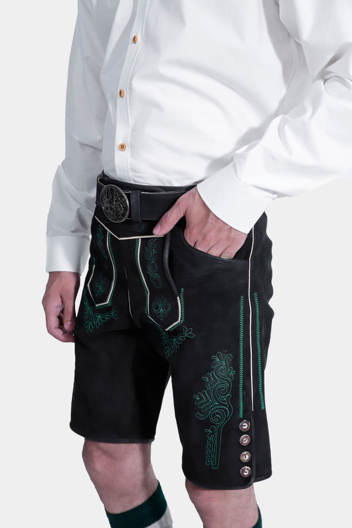 Close-up of the Gropius Lederhosen, showing the detailed belt, front pocket embroidery, and button design.