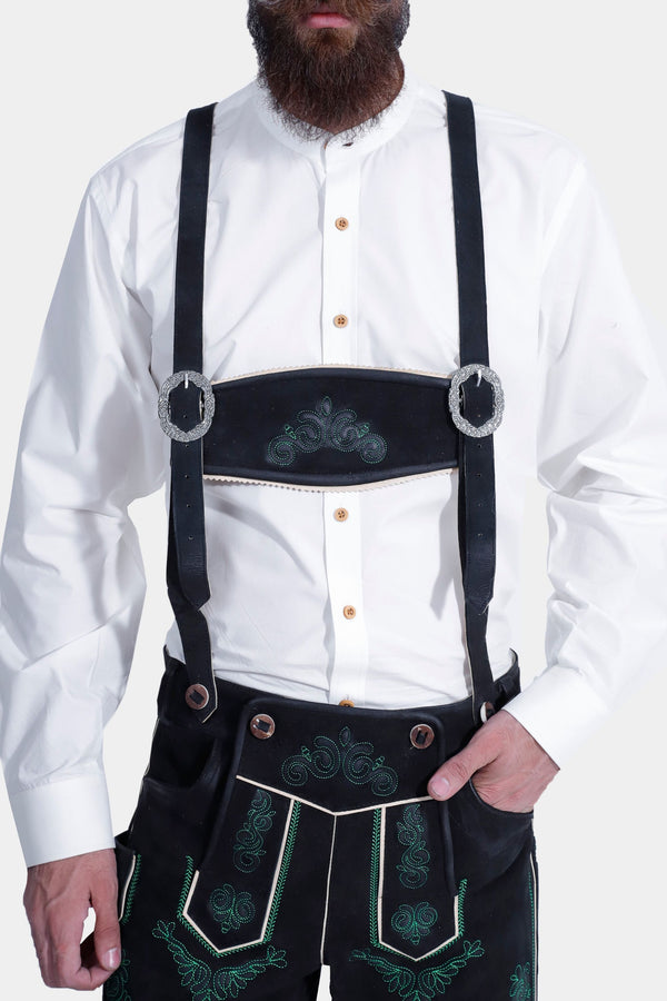 man wearing lederhosen suspenders