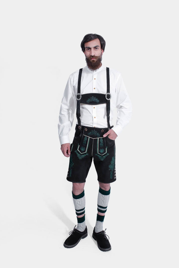 complete view of man wearing lederhosen suspenders