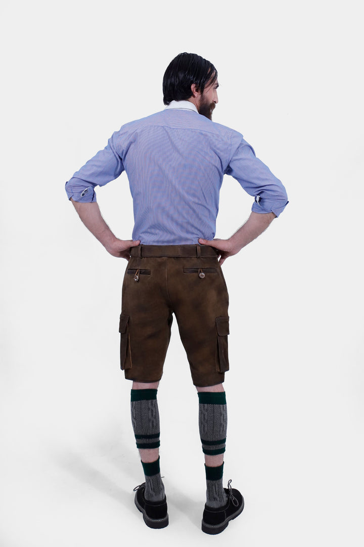 Rear view of a man wearing Hallstatt Cargo Lederhosen, showcasing the back pockets and detailed stitching of the traditional Bavarian leather shorts.