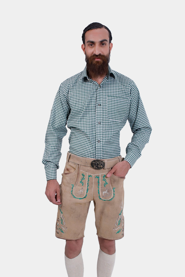 A man wearing the Luther Lederhosen in Meadow Ochre, paired with a green checkered shirt, showcasing the front view.