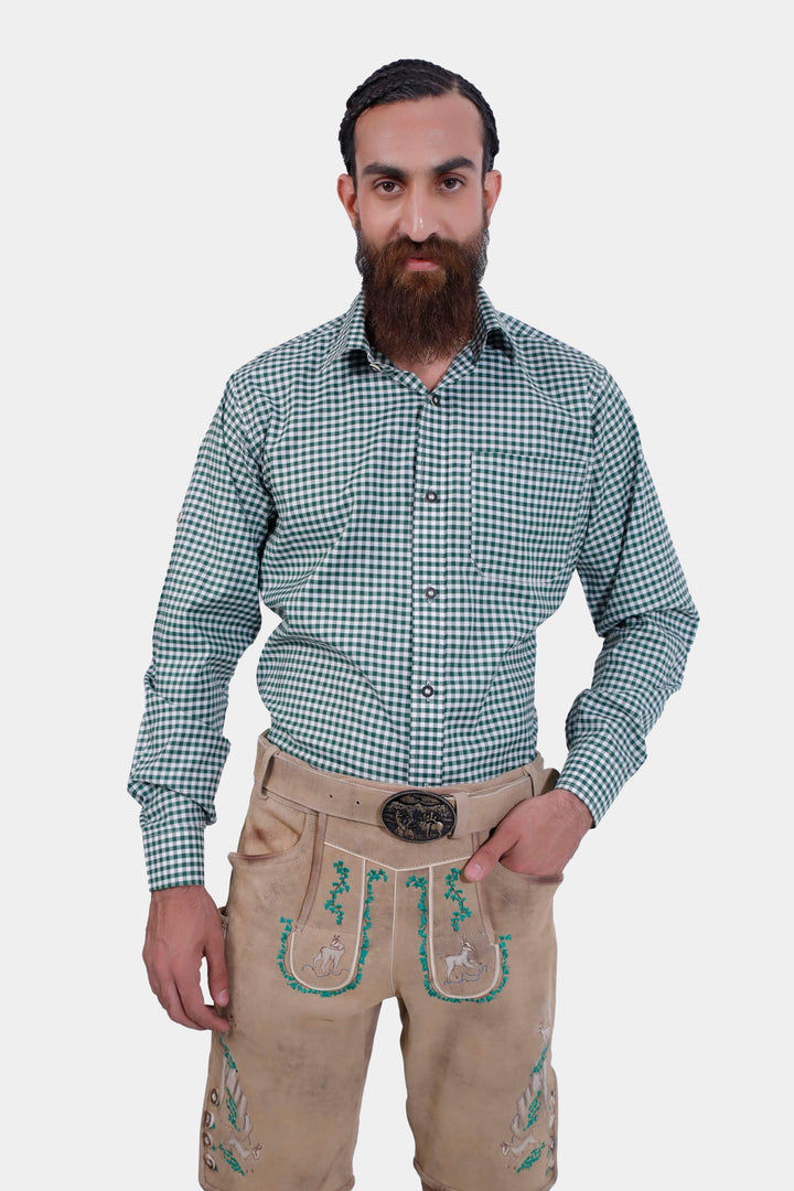 Full front view of the man wearing the Luther Lederhosen with a green checkered shirt, highlighting the knee-length and embroidered details.