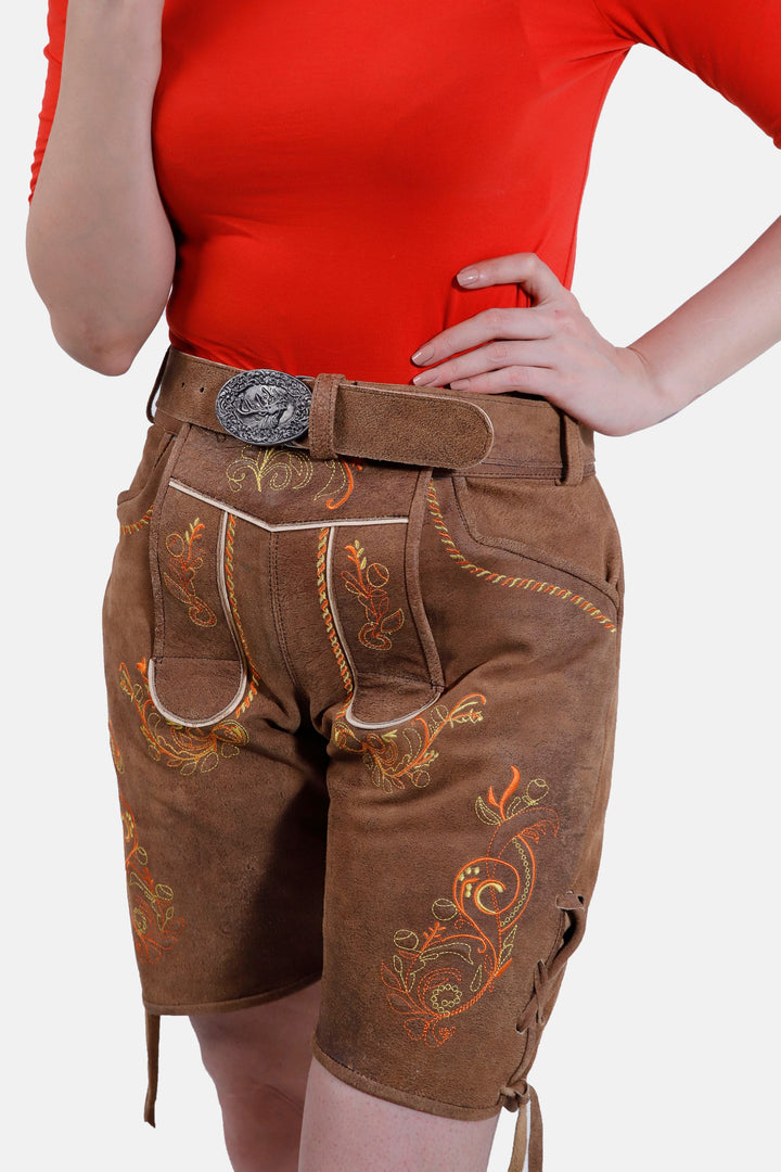 Side view of Queen Victoria Lederhosen showing detailed embroidery, front pockets, side knife pocket, and a decorative belt buckle.