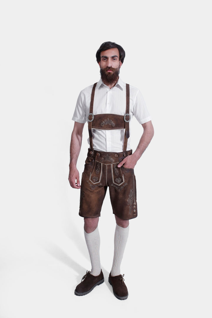 complete view of a man wearing traditional lederhosen suspenders