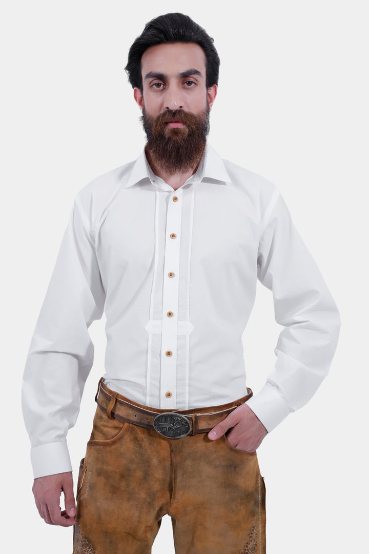 A man wearing the Rothenburg Lederhosen, front view. The lederhosen are made of light brown leather, paired with a white shirt featuring wooden buttons.