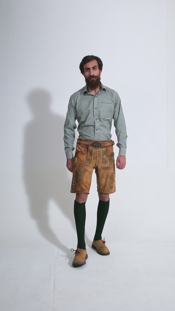 Man showcasing Durant Lederhosen Outfit, rotating to display all angles of the outfit, including front, side, and back views.