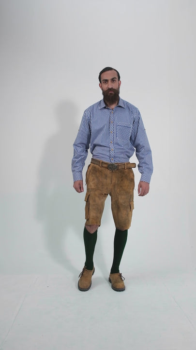 Man showcasing Franzl Lang Cargo Lederhosen, rotating to display all angles of the outfit, including front, side, and back views.