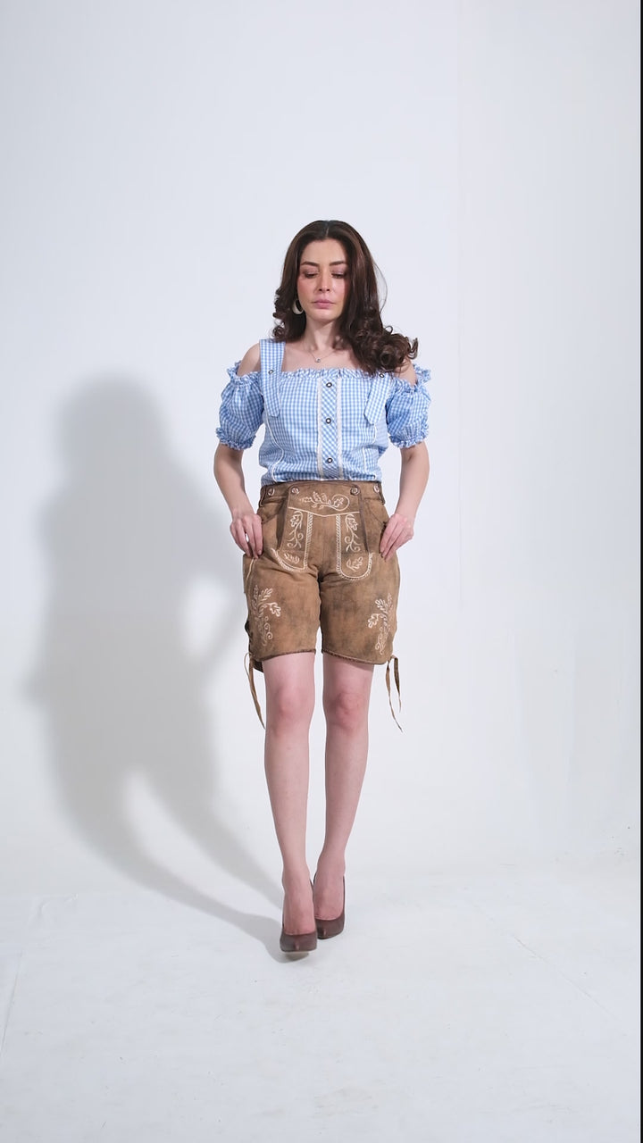 Video showcasing Rojinski Lederhosen Outfit: Luxurious goat suede leather shorts in Rustic Oak with intricate embroidery and stylish details.